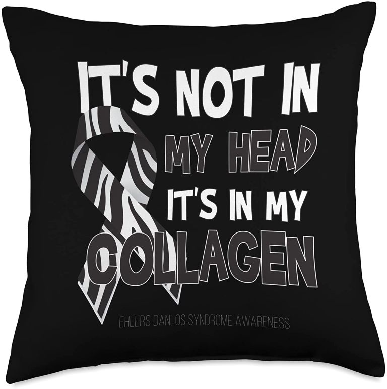 A black pillow with white letters: It's not in my head; it's in my collagen.