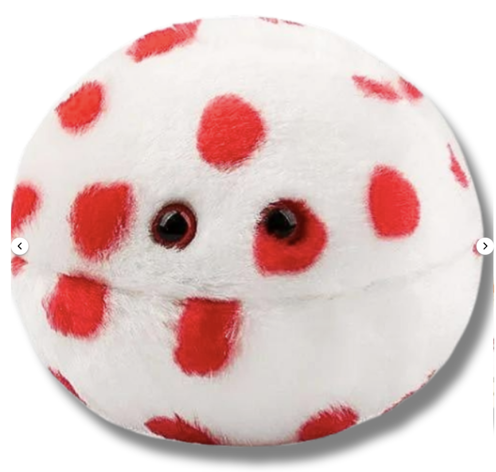 A round white plushie with red spots all over it and two black button eyes.