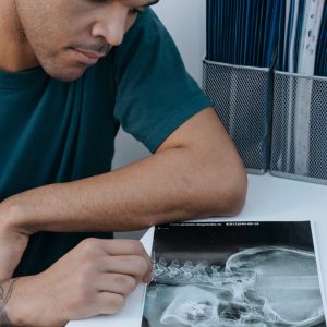 a man looking at an x ray image