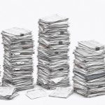 Minimalist graphite sketch of five towering stacks of administrative forms, folders, and clipped papers against a plain white background.